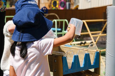 Children exploring outdoor music and sound at Expeditions Narre Warren