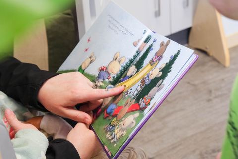 An open picture book during shared reading at Expeditions Officer