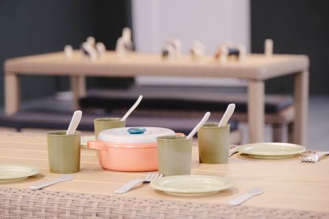 A table set with pretend cooking materials at Expeditions Raceview 2
