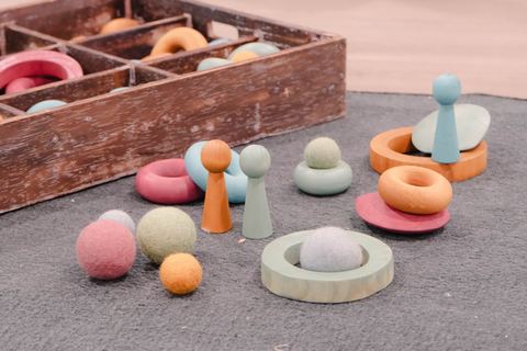 Colourful loose parts and wooden play materials at Expeditions Raceview 2