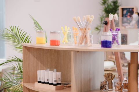 Paint brushes and pots at an art station at Expeditions Raceview 2