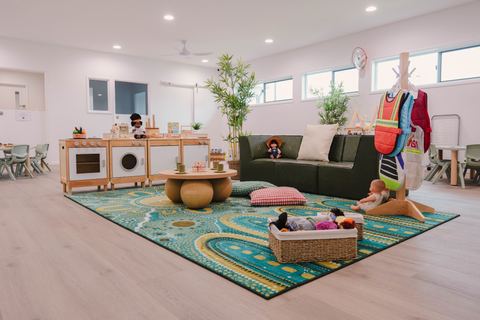 A spacious learning room with pretend kitchen and gathering areas at Expeditions Raceview 2