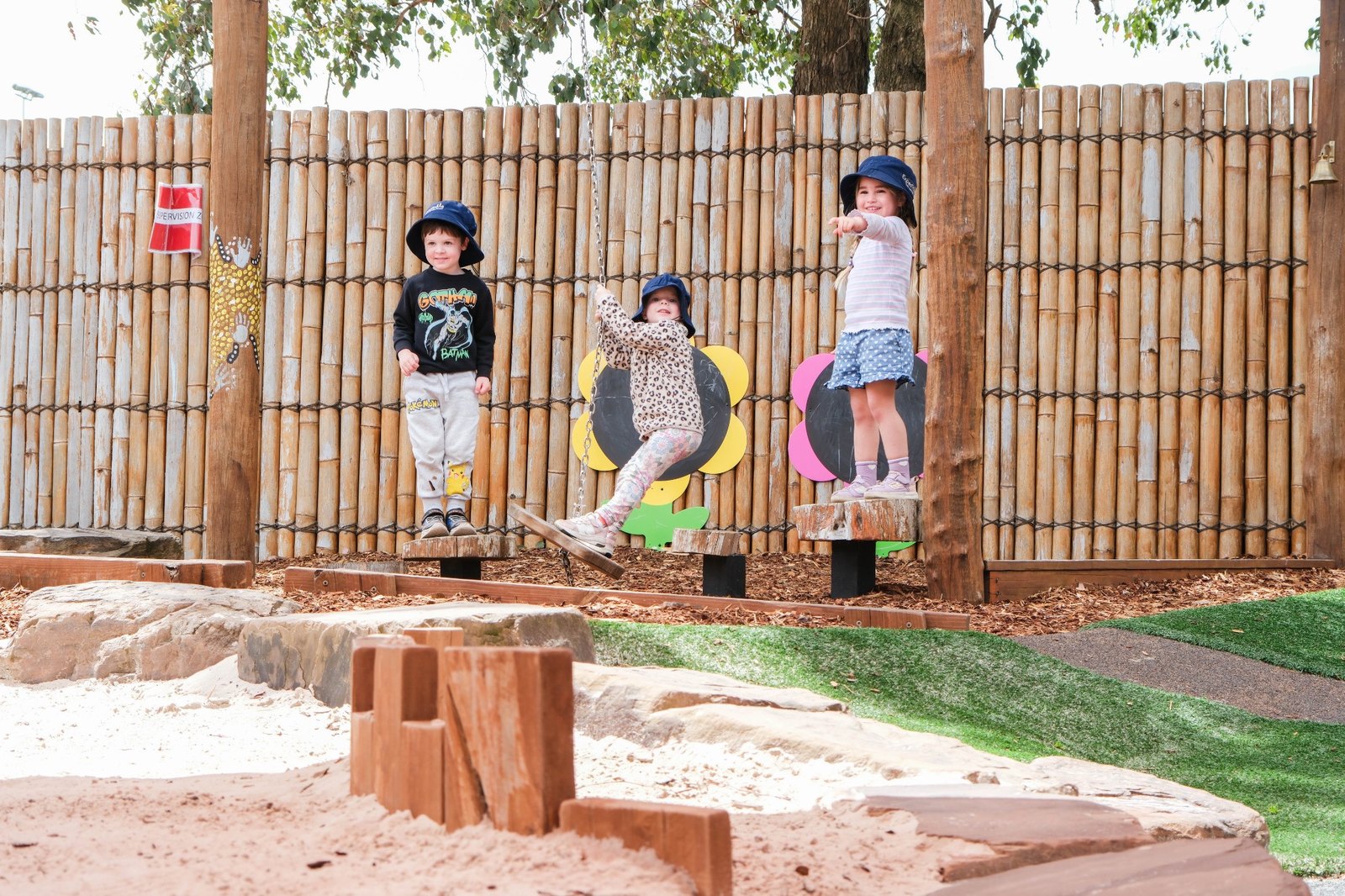 Children exploring the outdoor play space at Expeditions Narre Warren